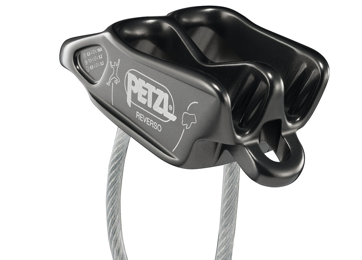 Side view of the Petzl Reverso, cleary showing the tubes, the belay loop, and the guide mode loop.