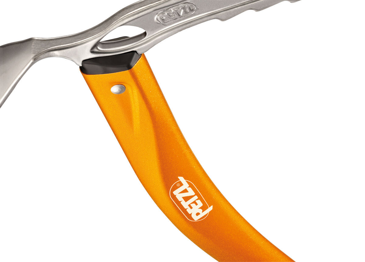 Toothed tip ice axe for good anchoring in hard snow and ice